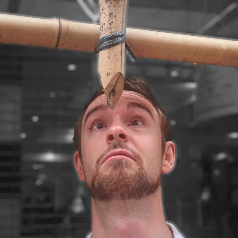 Me nearly impaling my head into a sharp piece of bamboo above me